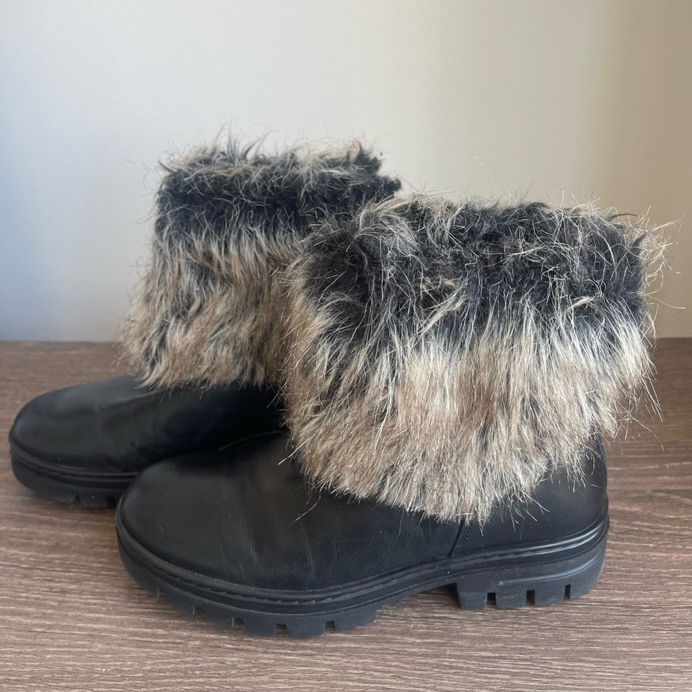 Eric Michael black Leather and fur boots for women.